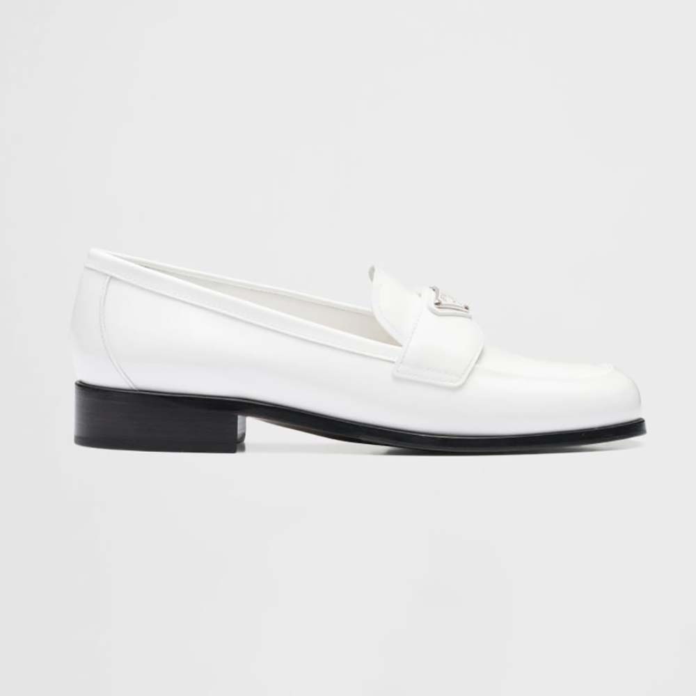 Side view of Prada Women Patent Leather Loafers in 25 mm Heel Height-White