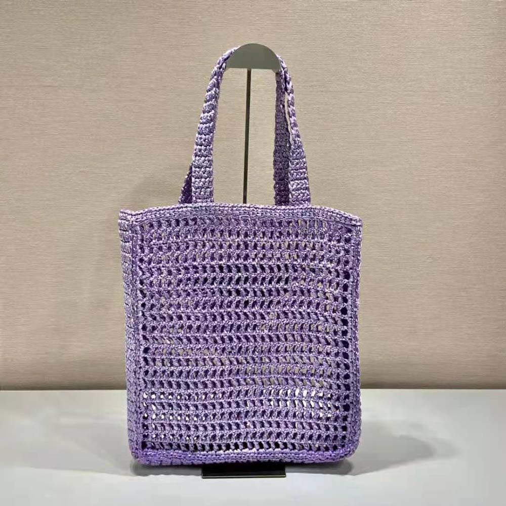 Side angle showing spacious tote silhouette and silver hardware