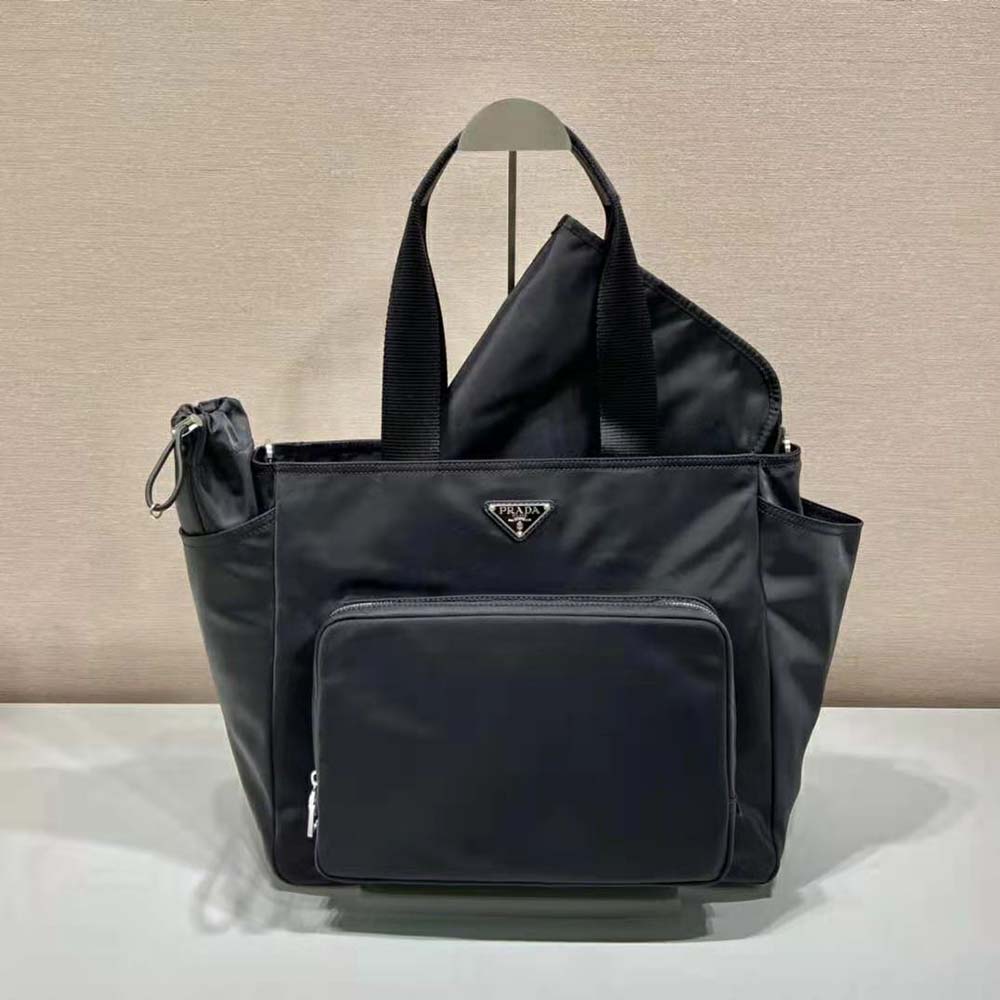Close-up of gunmetal hardware and black Re-Nylon fabric on Prada bag