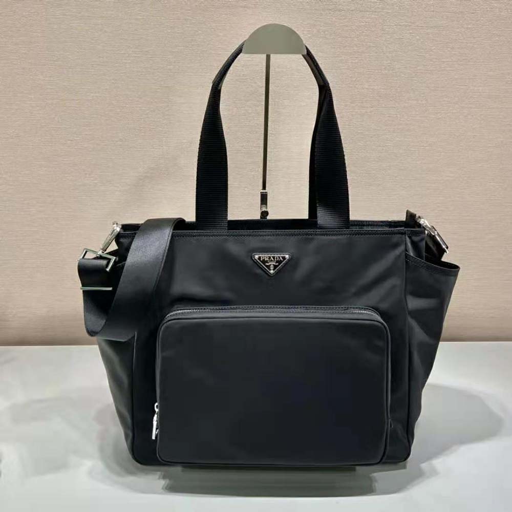 Interior shot showing signature logo-print lining in Prada Women Re-Nylon Baby Bag