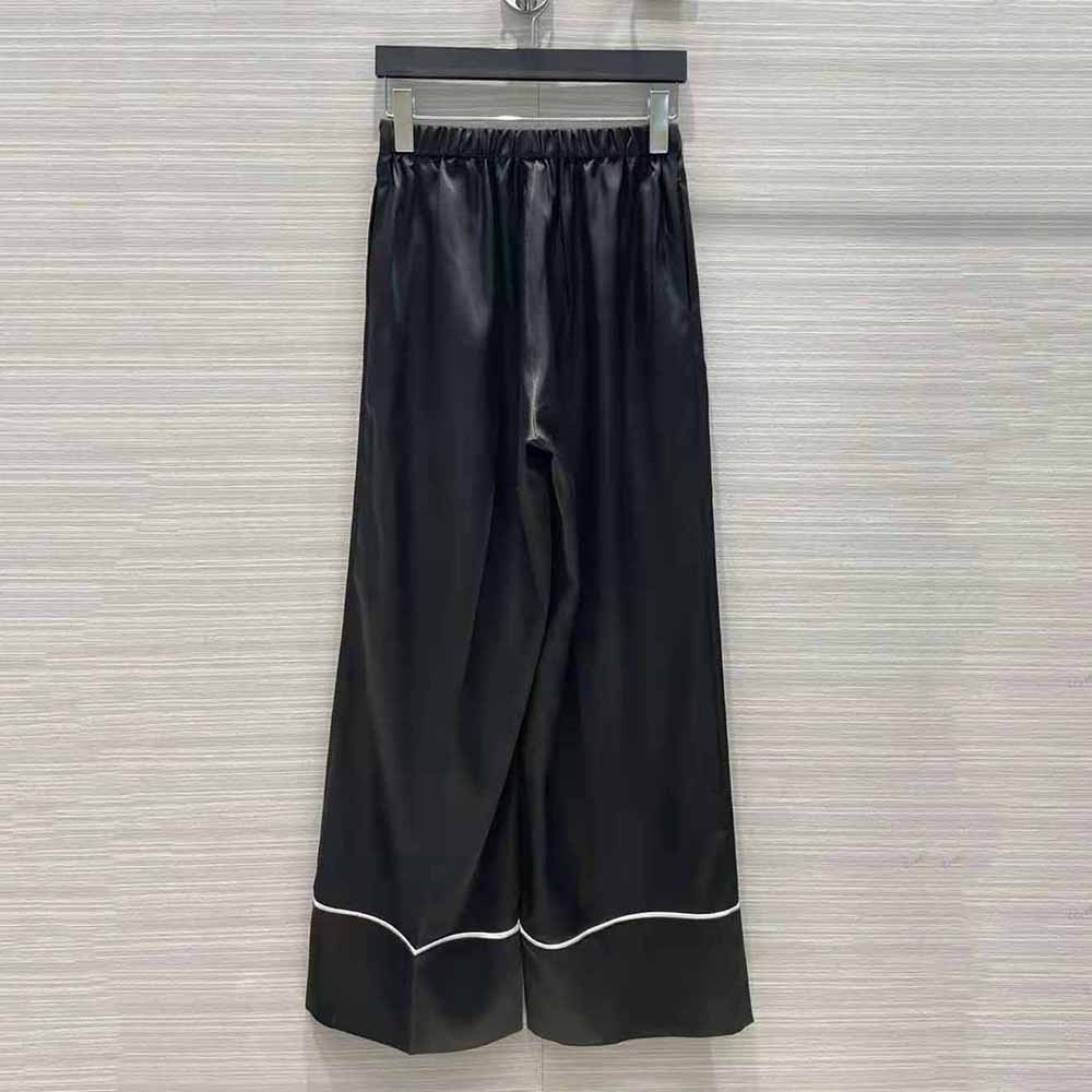 Side angle showing tailored straight-leg of Prada Women Twill Pants