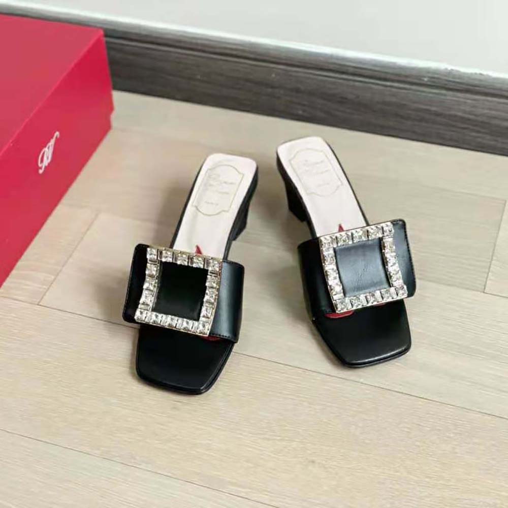 Top angle showing satin texture and mule silhouette on Roger Vivier shoes