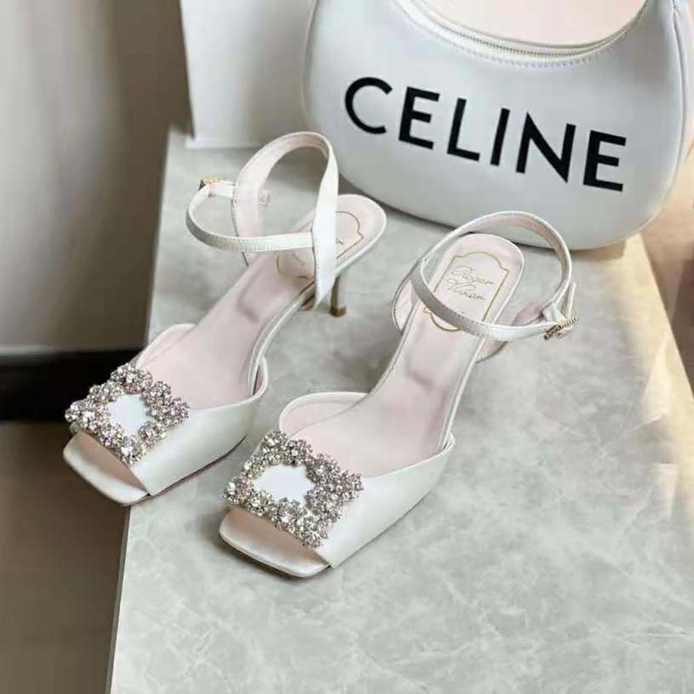 Close-up of flower strass buckle on Roger Vivier Satin-White sandals