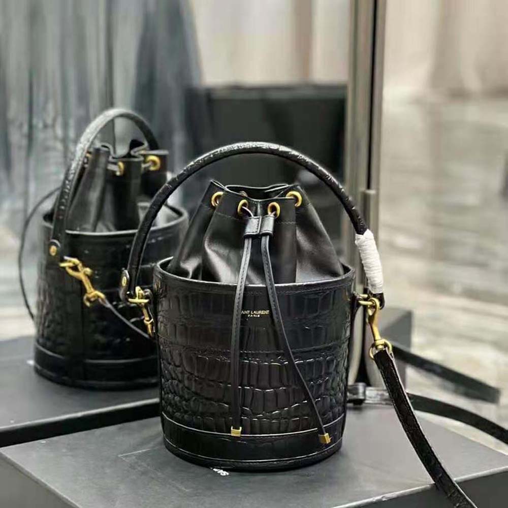 Side profile showing silhouette of Saint Laurent YSL Bahia Small Bucket Bag