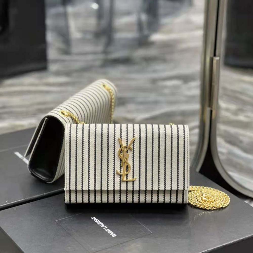 Close-up of gold-tone YSL logo and chain strap detail on Kate Small Chain Bag