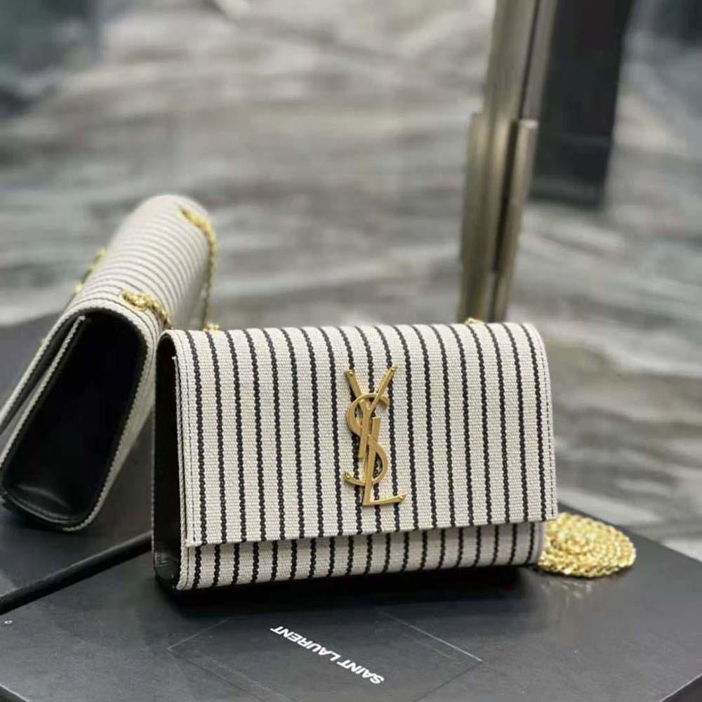 Side angle showing silhouette and smooth leather trim of Saint Laurent YSL Kate bag