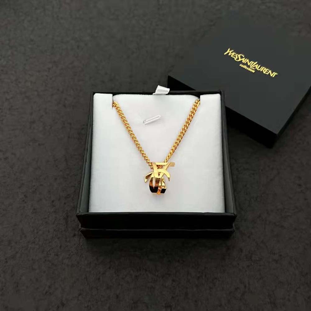 Side angle showing lobster clasp and twist design of Saint Laurent YSL Women Monogram Twist Pendant Necklace