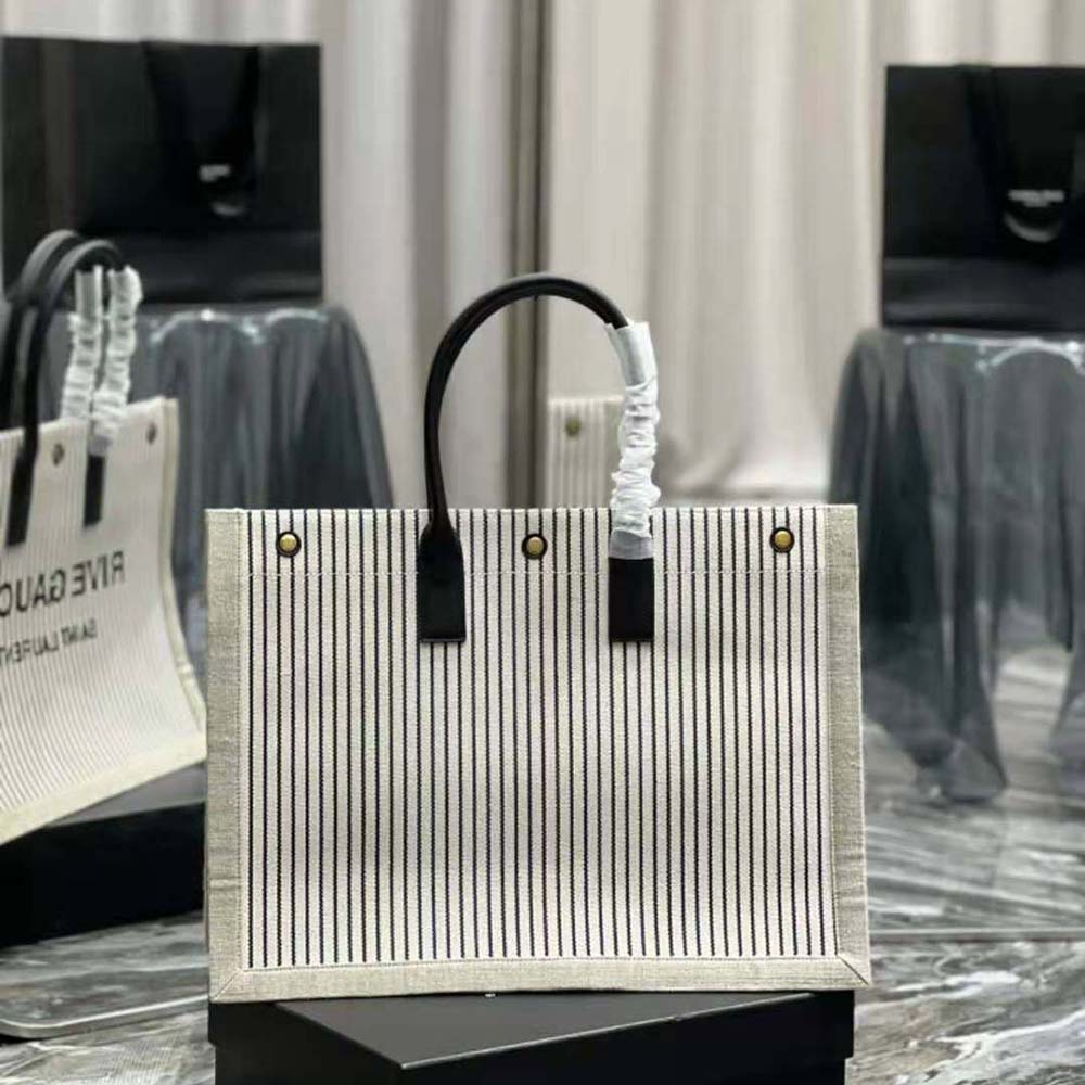 Side angle showing spacious silhouette of Saint Laurent YSL Women Rive Gauche Tote Bag