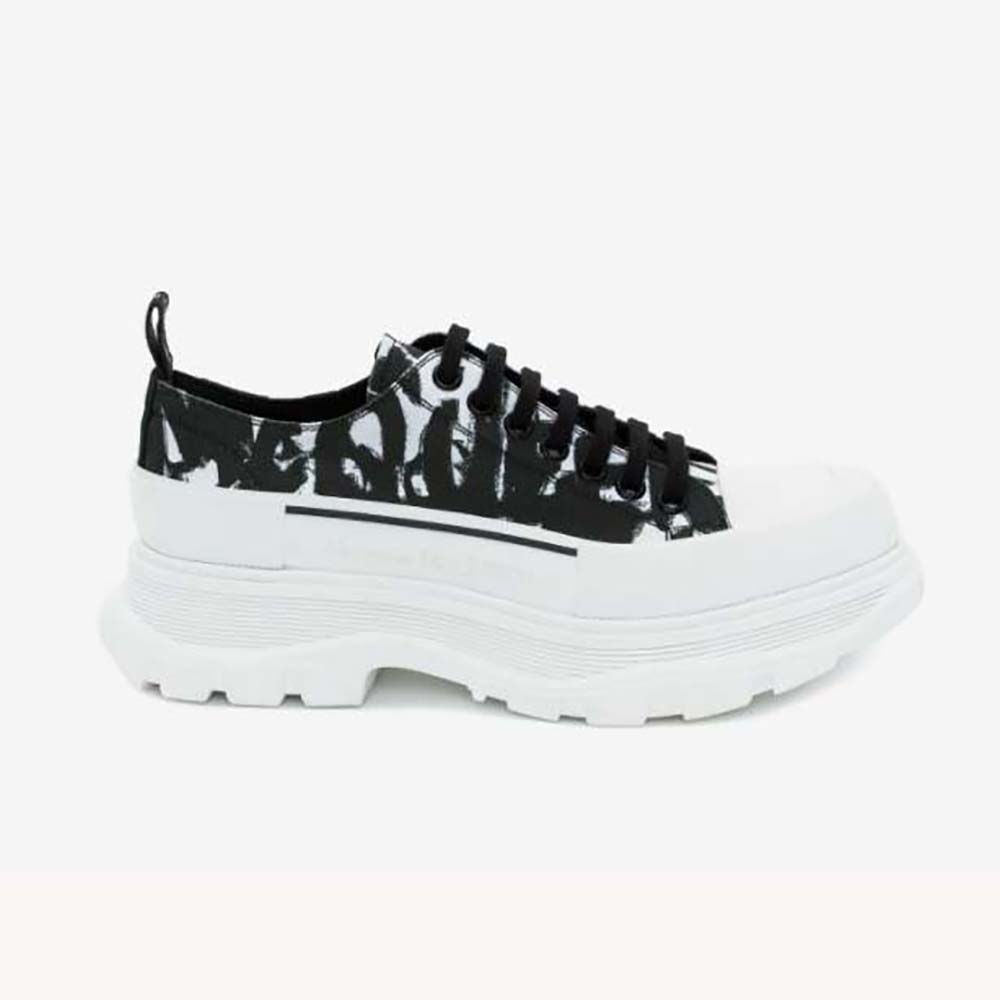Side view of Alexander Mcqueen Unisex McQueen Graffiti Tread Slick Lace-up in Black/White