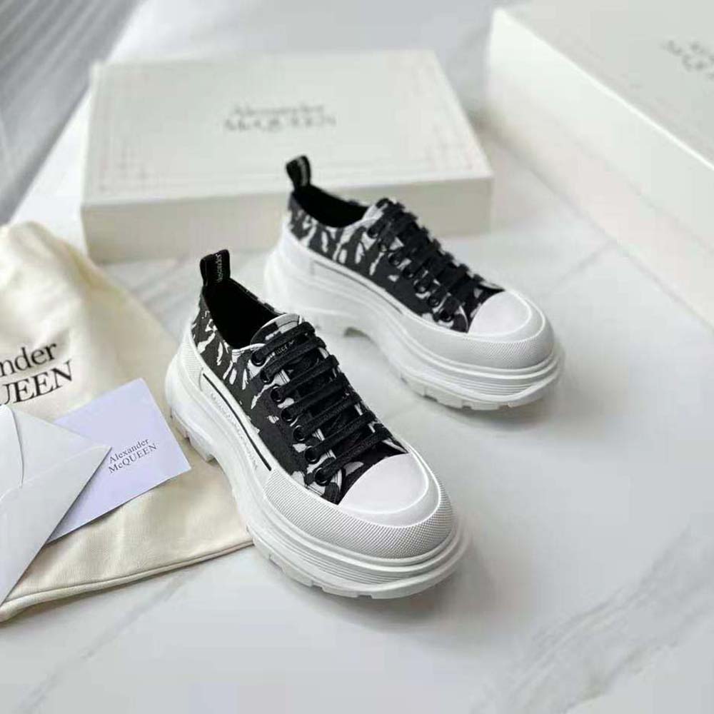 Top angle showing lace-up details on Alexander Mcqueen Unisex McQueen Graffiti Tread Slick Lace-up