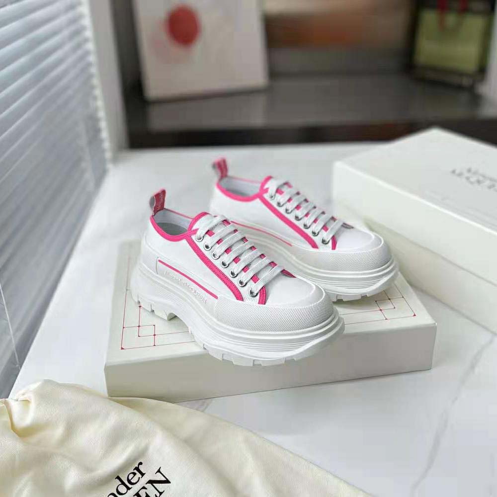 Close-up of pink leather and tread sole on Alexander Mcqueen sneaker
