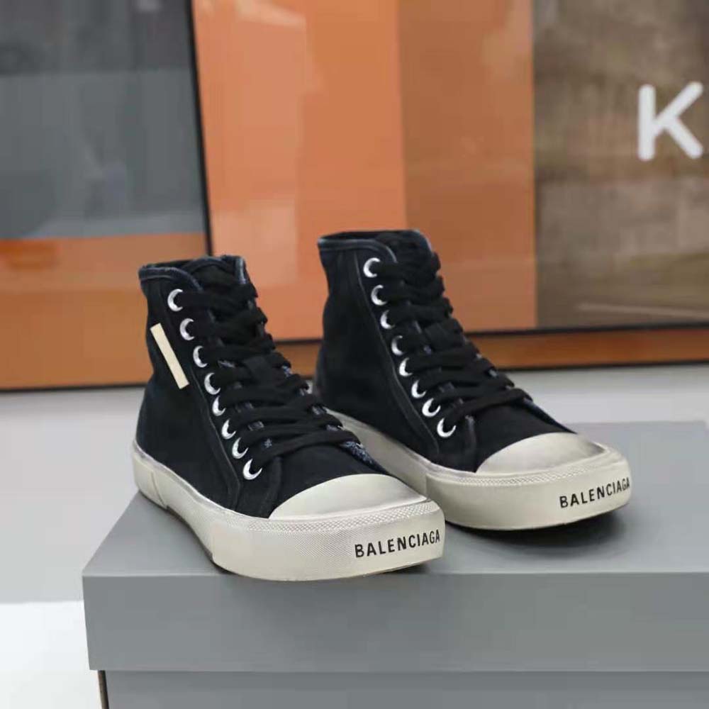 Top-down angle showing white rubber sole and lacing on Balenciaga sneaker