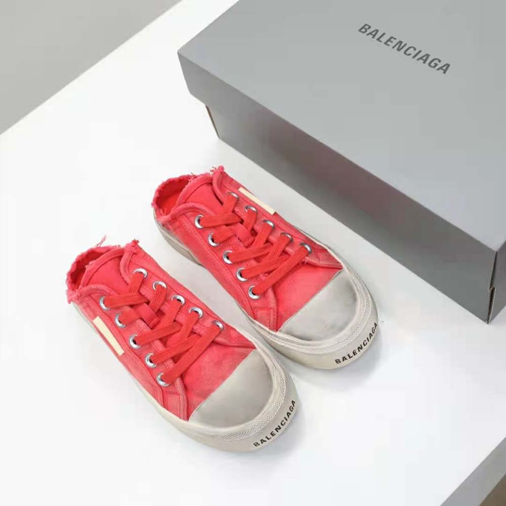 Close-up of distressed cotton upper on Balenciaga Paris Sneaker Mule
