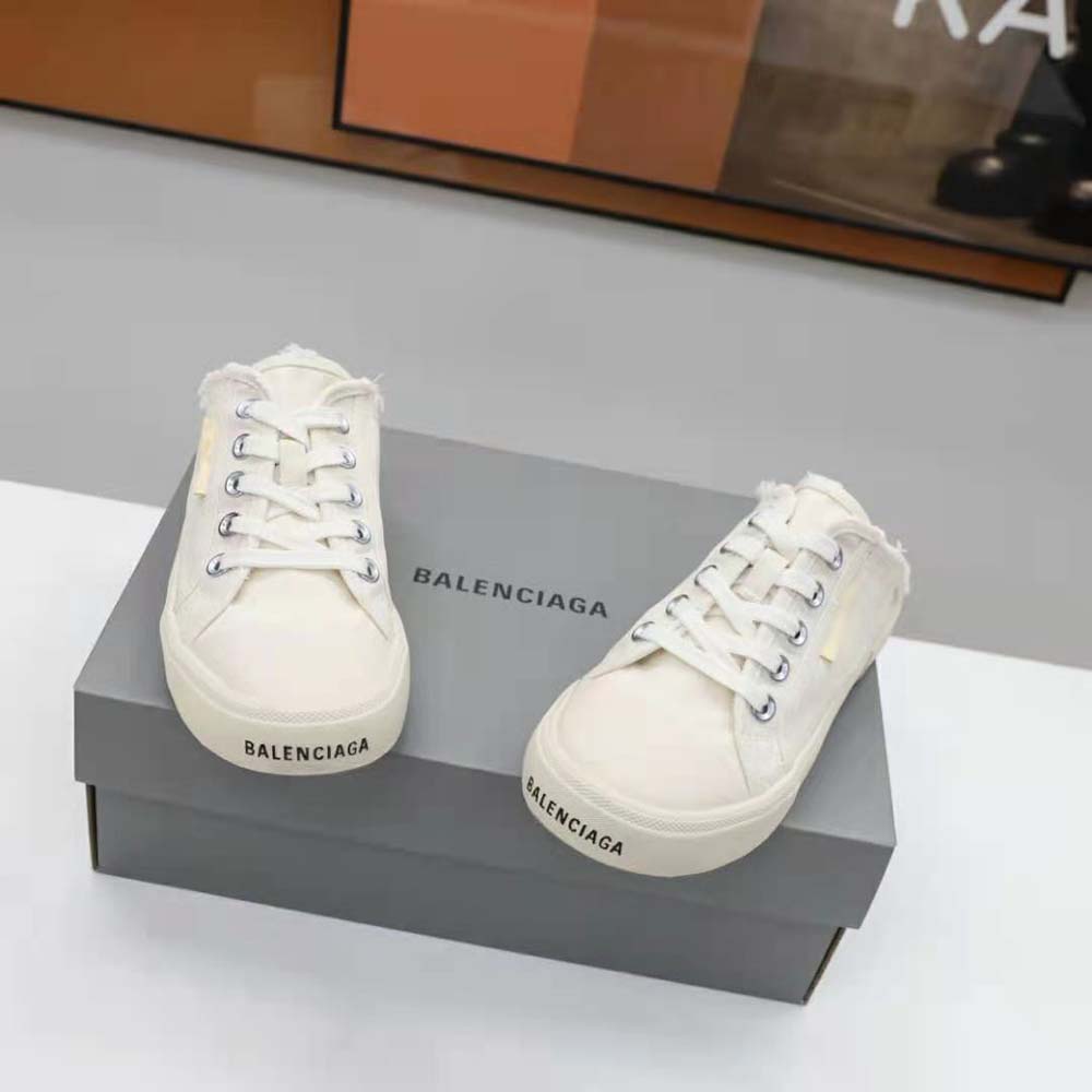 Top-down angle showing slip-on design of Balenciaga Paris Sneaker Mule in white