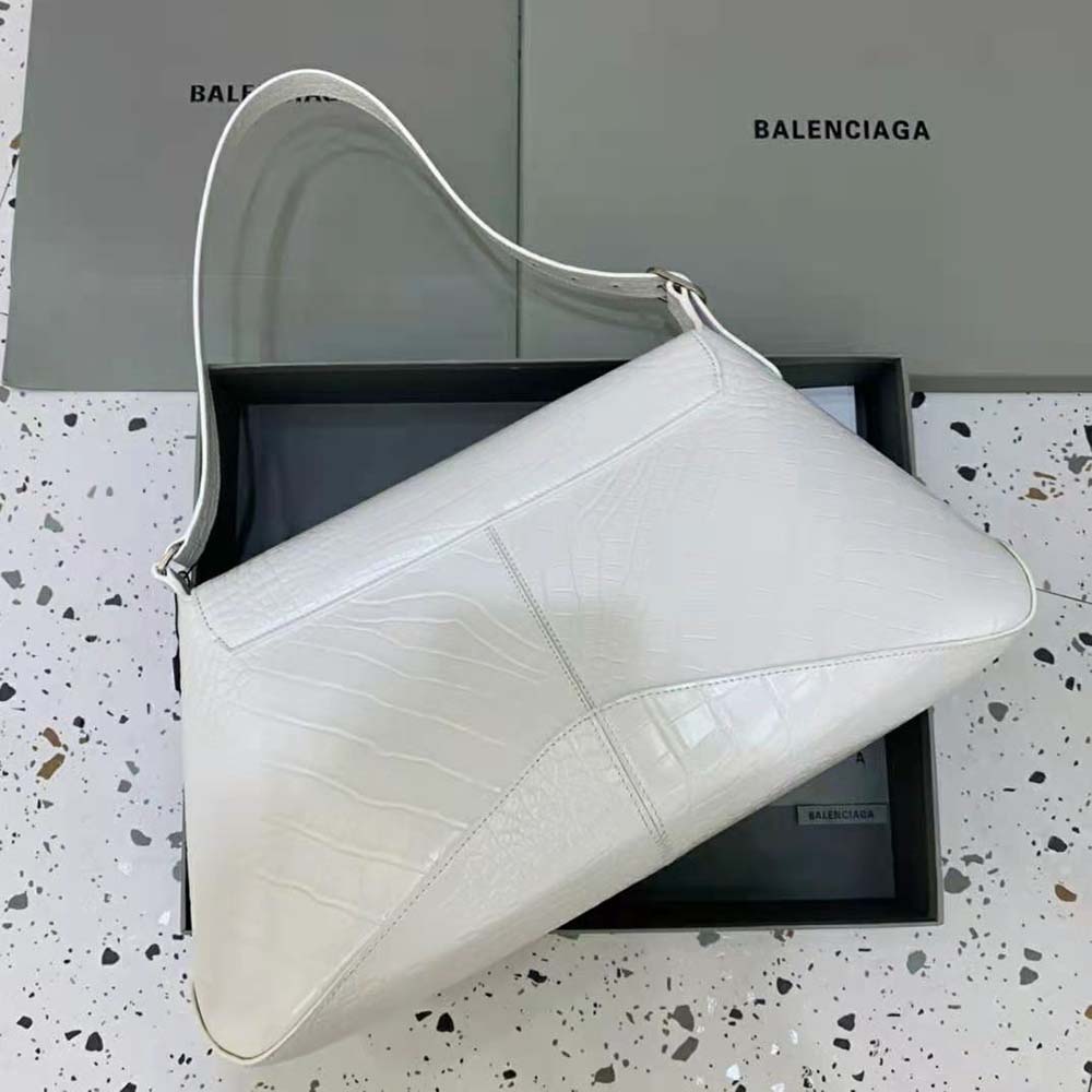 Side angle showing silhouette and adjustable strap of Balenciaga XX XL flap bag