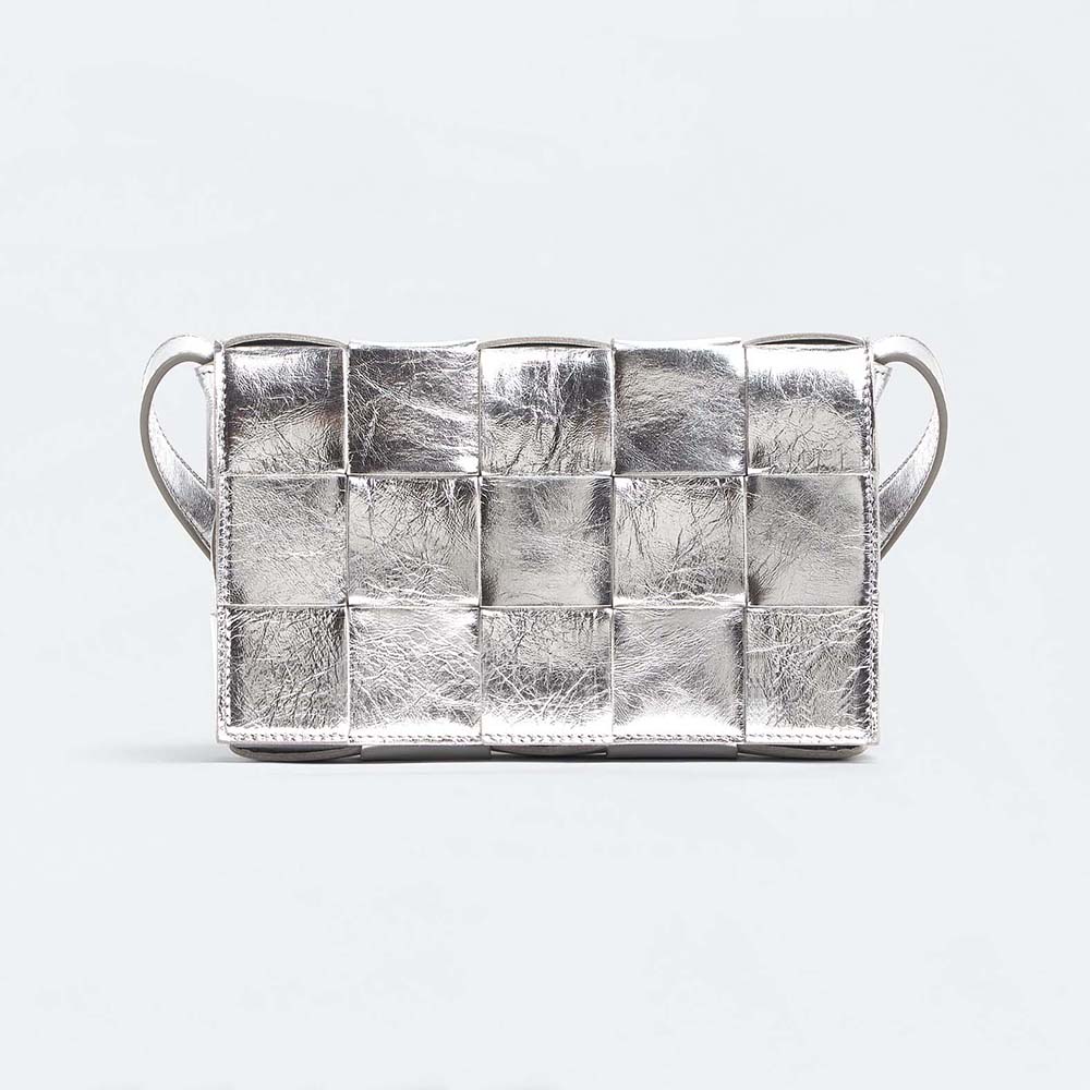 Front view of Bottega Veneta Women Cassette Intreccio Laminated Leather Cross-Body Bag in gray