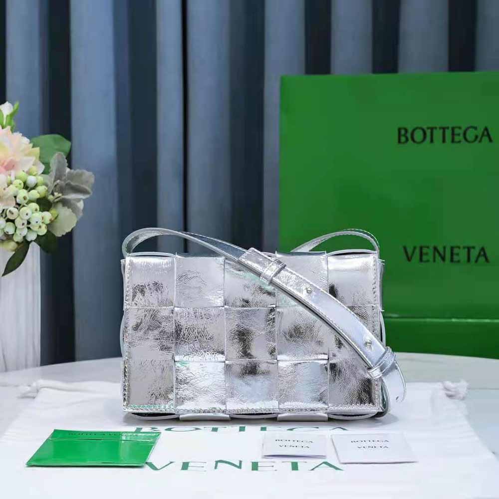 Close-up on laminated intrecciato leather weave of the Bottega Veneta Cross-Body Bag