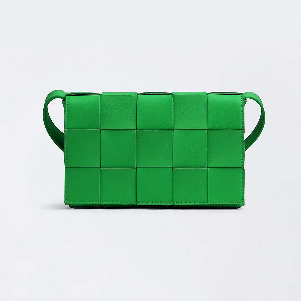 Front view of Bottega Veneta Women Cassette Intreccio Leather Cross-Body Bag-Green with flap closed