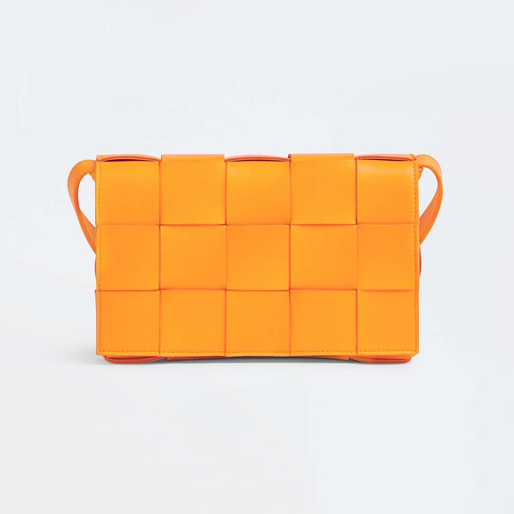 Front view of Bottega Veneta Women Cassette Intreccio Leather Cross-Body Bag-Orange