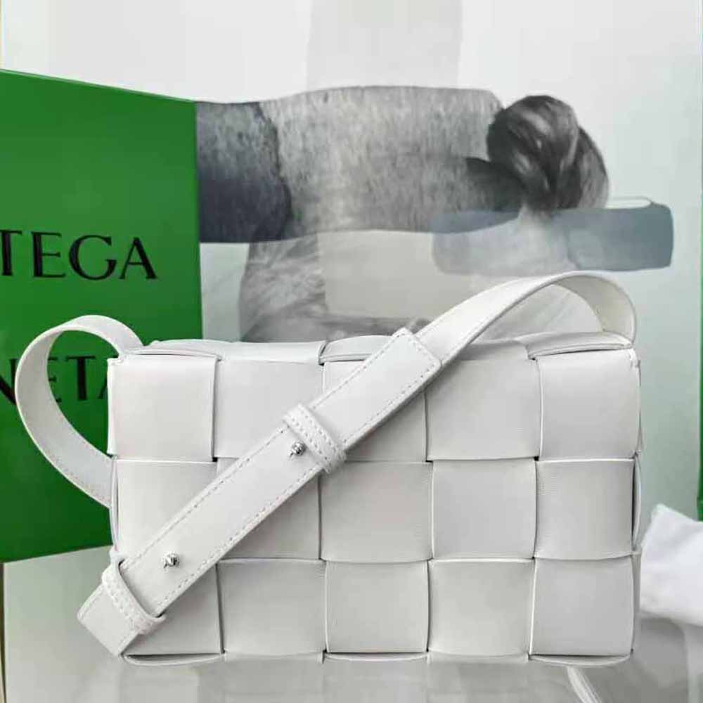 Side angle showing compact silhouette of Bottega Veneta Women Cassette Cross-Body Bag