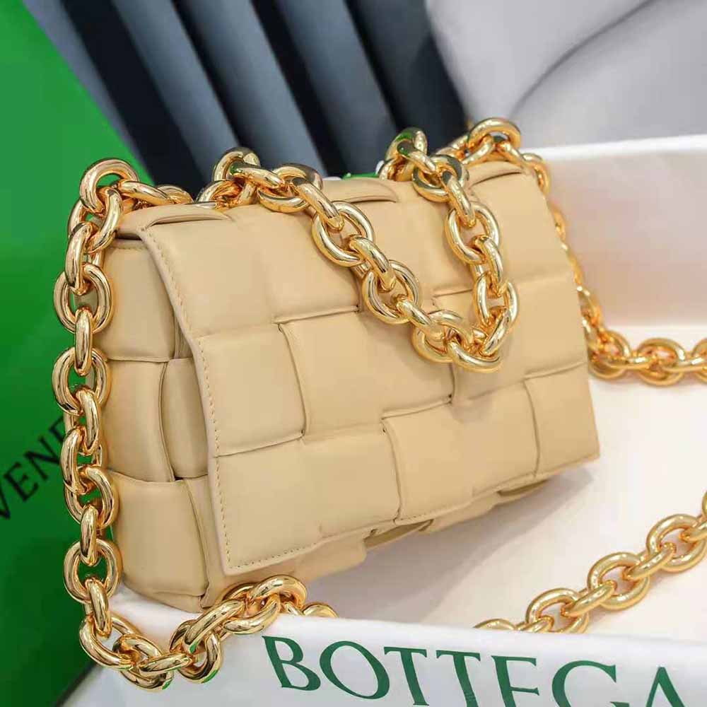 Side view showing compact silhouette of Bottega Veneta Chain Cassette Padded Leather Crossbody Bag