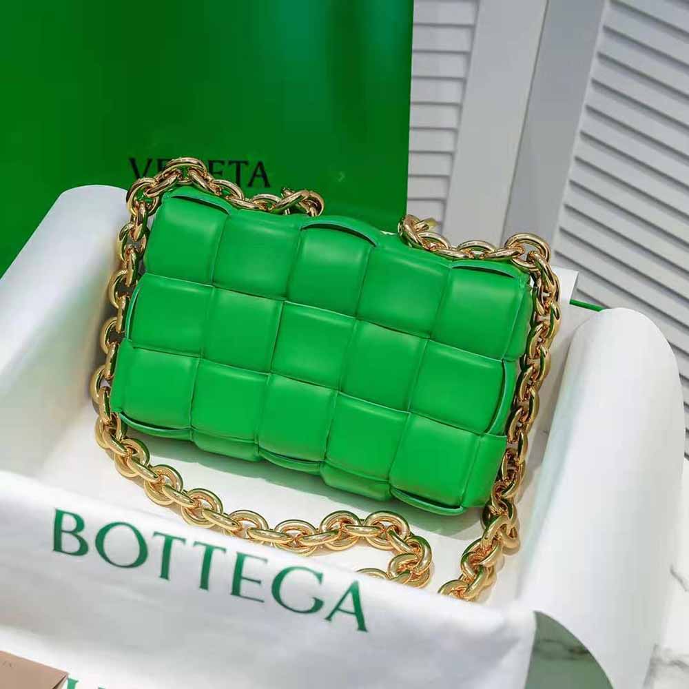 Side angle showing silhouette and magnetic closure of Bottega Veneta crossbody bag