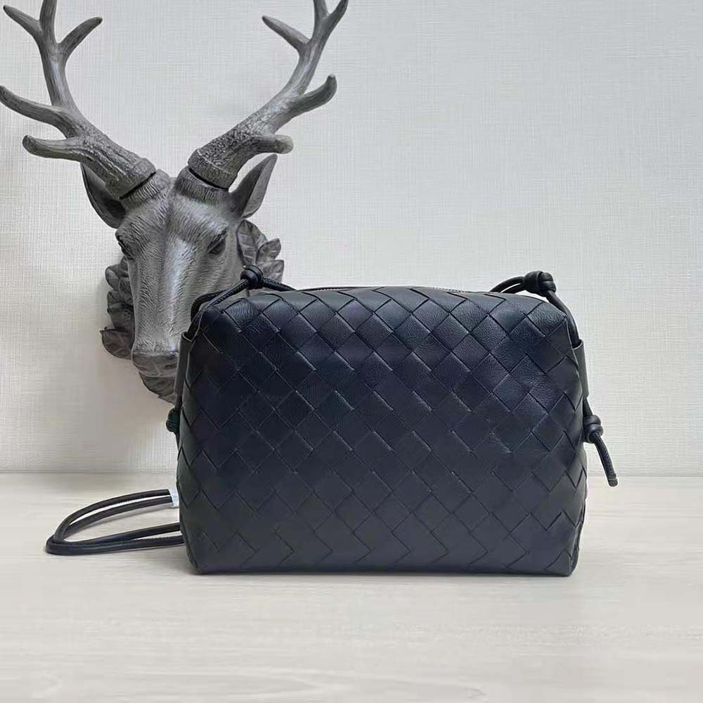 Close-up of signature intrecciato leather weave and silver hardware details