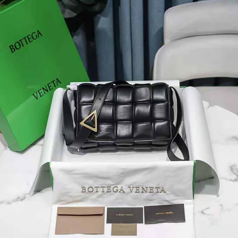 Close-up detail of padded intreccio leather weave on Bottega Veneta cross-body bag
