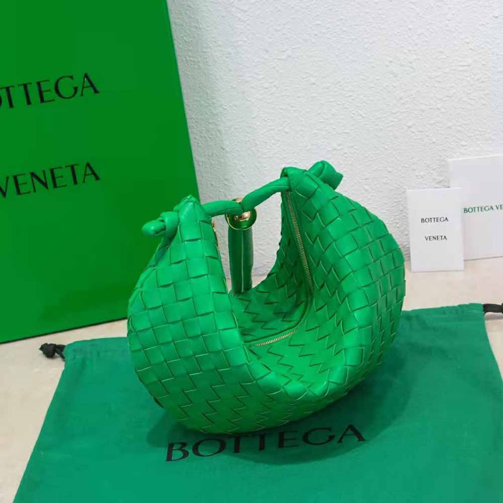 Side profile showing adjustable strap on Bottega Veneta leather pouch