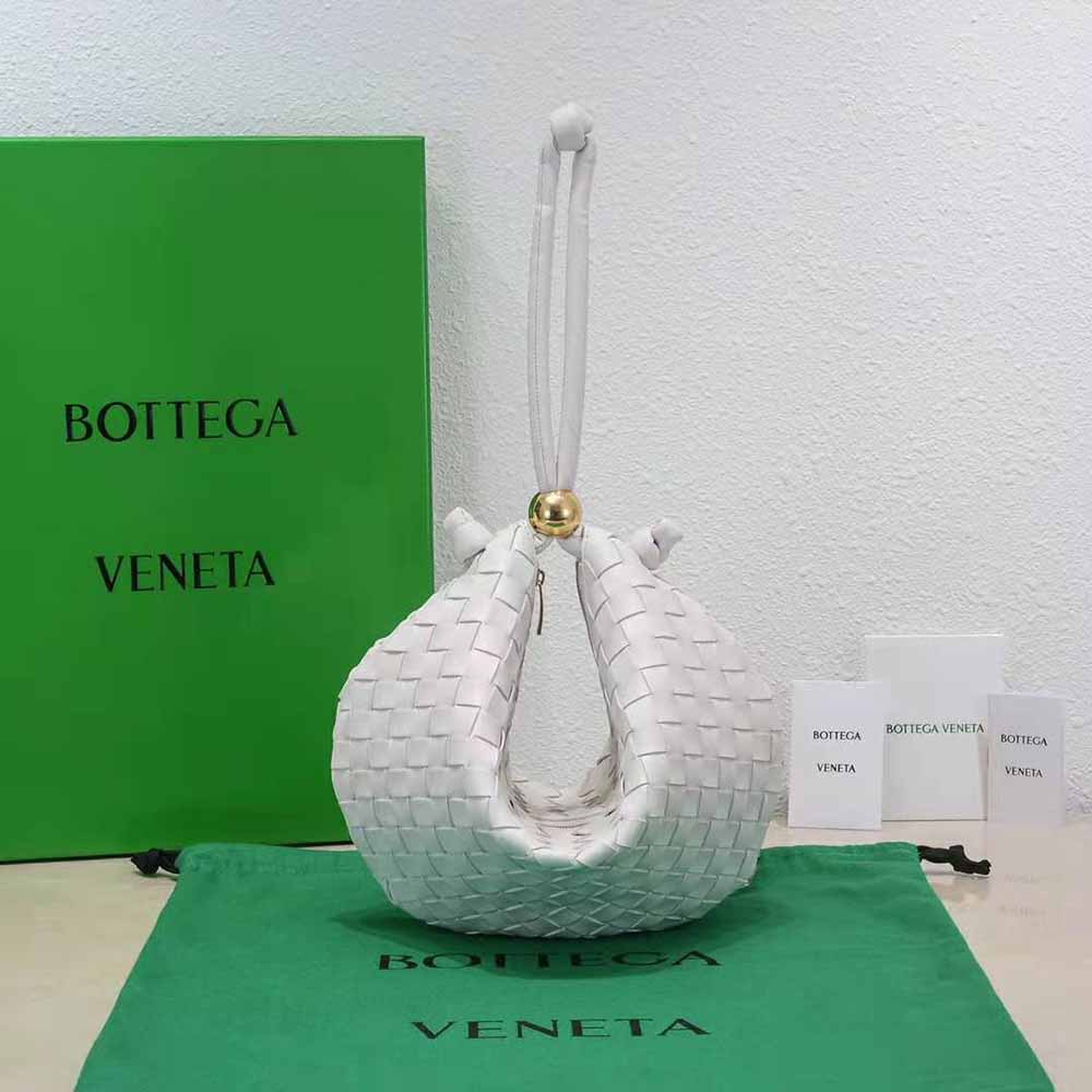 Close-up of intrecciato leather texture on Bottega Veneta pouch