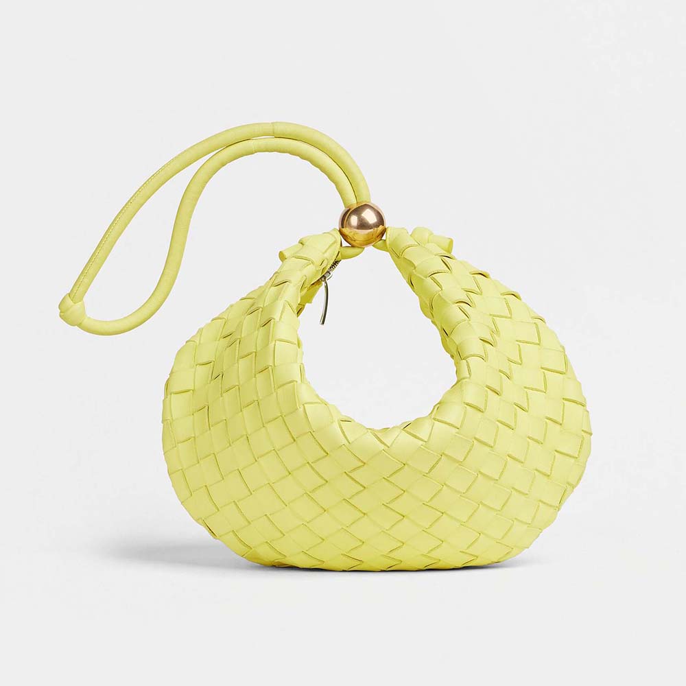 Front view of Bottega Veneta Women Turn Medium Intrecciato Leather Pouch in yellow