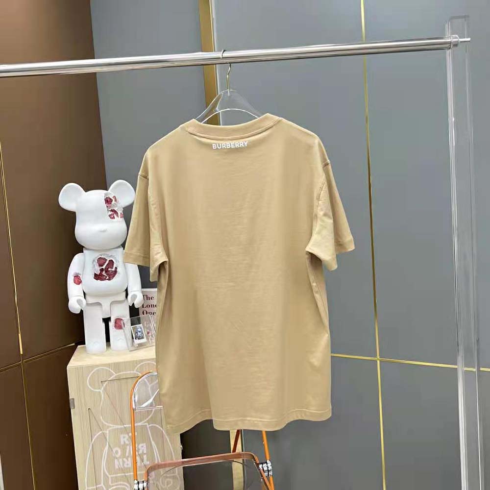 Side angle showing oversized silhouette of Burberry Women Deer Print Cotton Oversized T-shirt-Brown