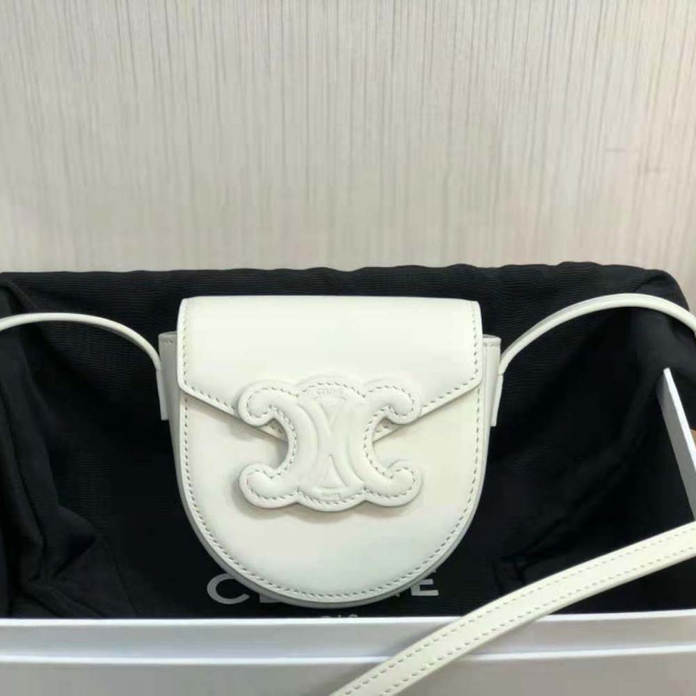 Side angle showing smooth calfskin texture on Celine Women Mini Besace Cuir Triomphe