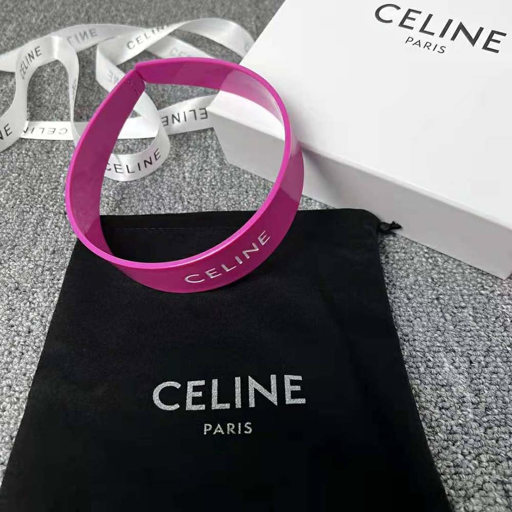 Side angle showing slim silhouette and signature on Celine Women Monochroms Headband