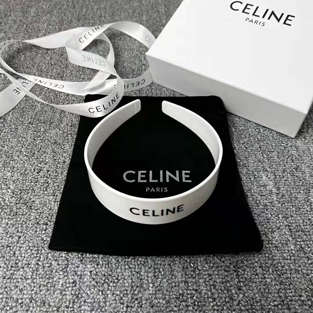Close-up showing glossy white acetate of Celine Women Monochroms Celine Headband