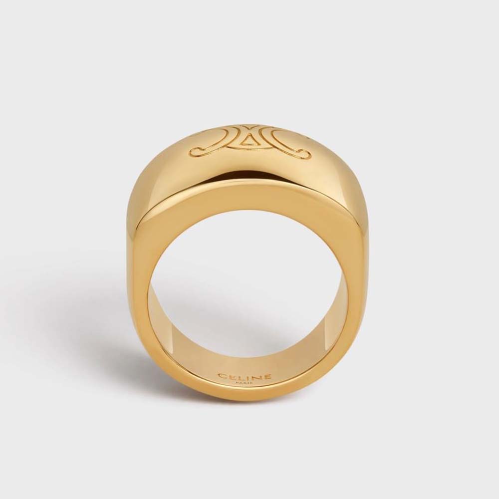 Close-up of Celine Women Triomphe Bold Ring gold finish detail