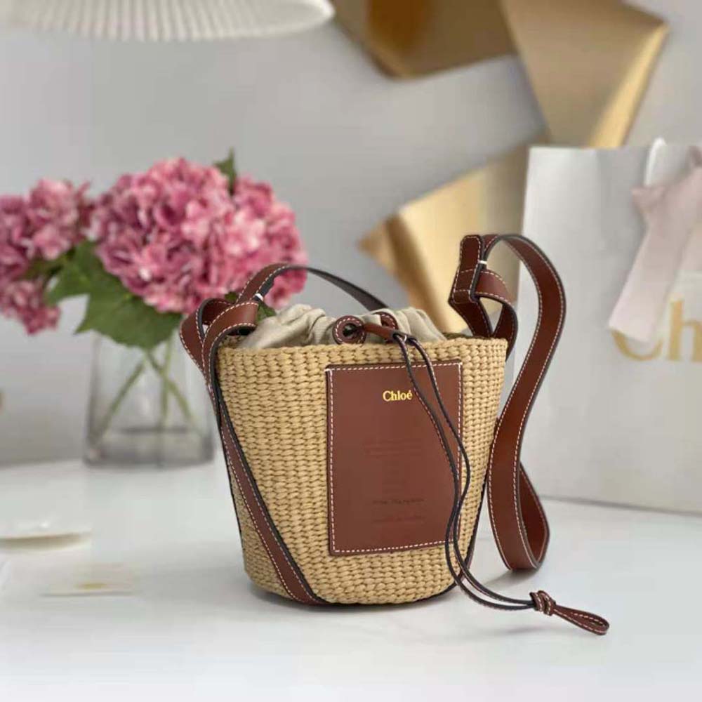 Side profile showing compact silhouette of Chloe Women Small Basket