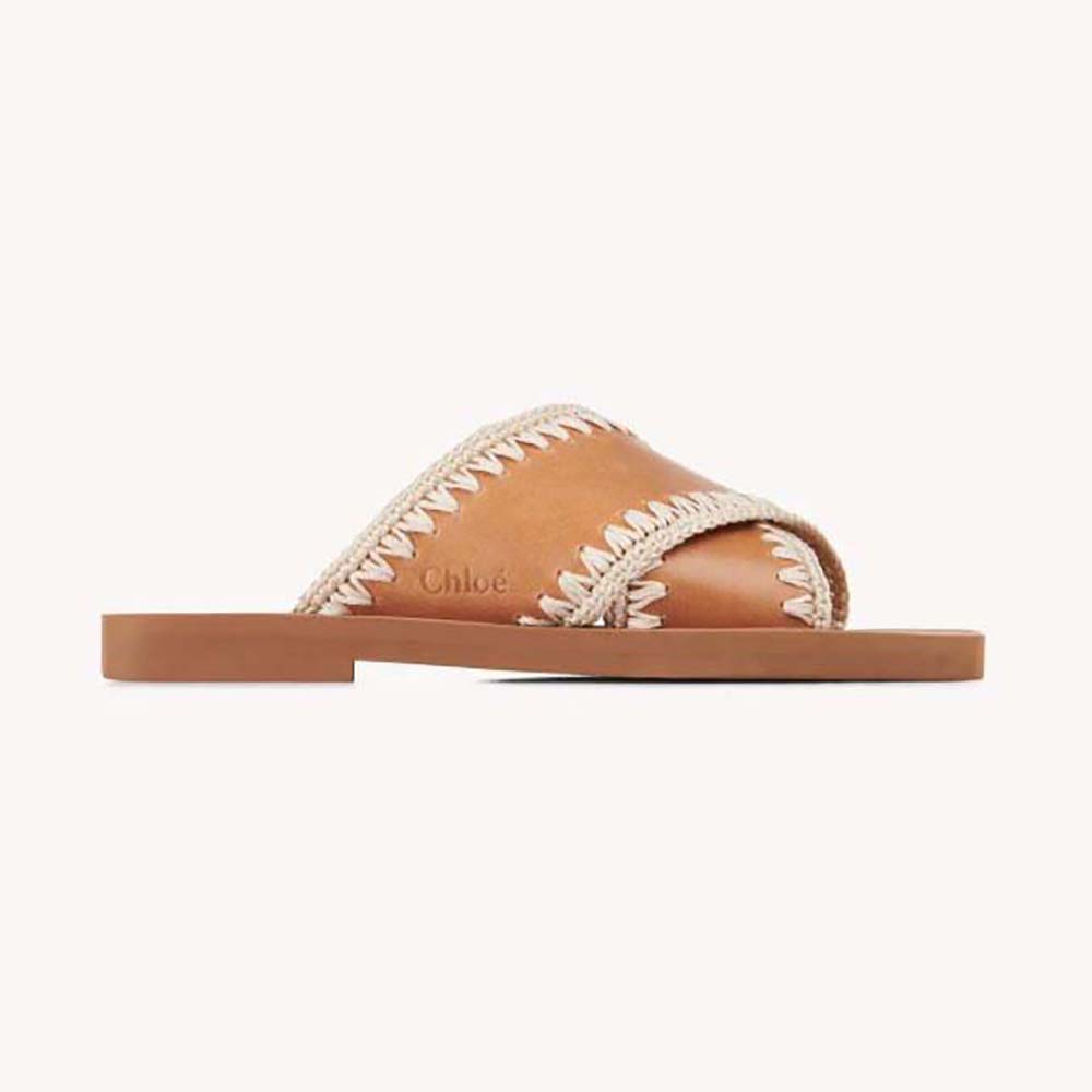 Side view of Chloe Women Woody Flat Slide-Brown showing smooth leather