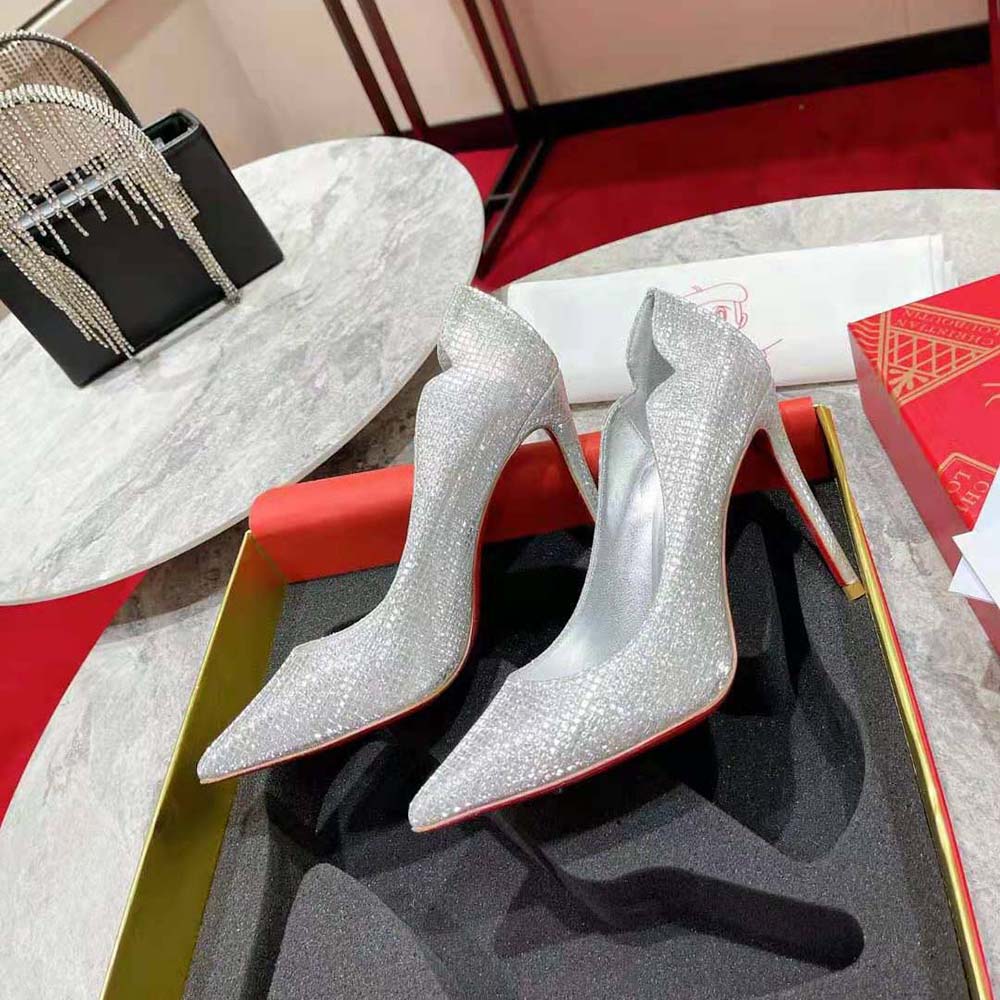 Close-up on signature red sole of Christian Louboutin Women Hot Chick 100 mm Heel Height-Silver