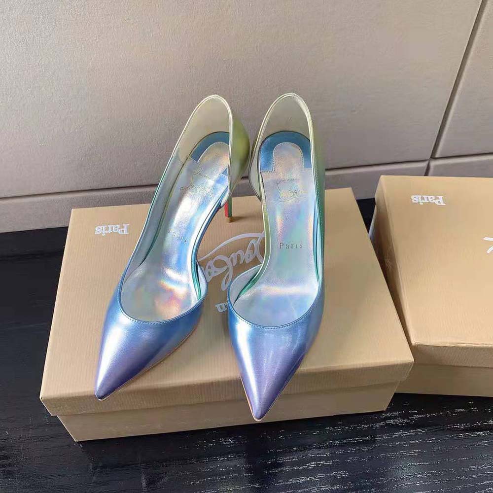 View of signature red sole and 100 mm heel on Christian Louboutin Women Lriza purple shoe
