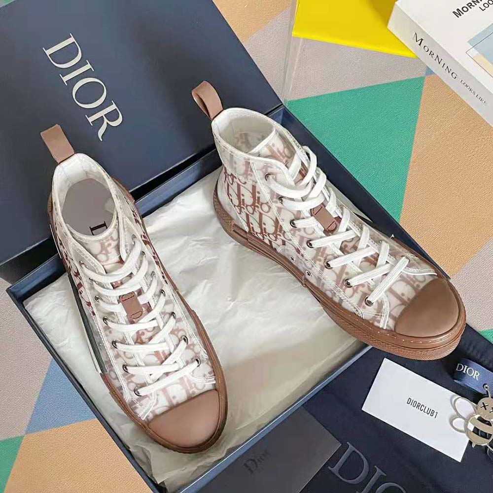 Close-up of coffee brown Dior Oblique canvas and branded sole detail
