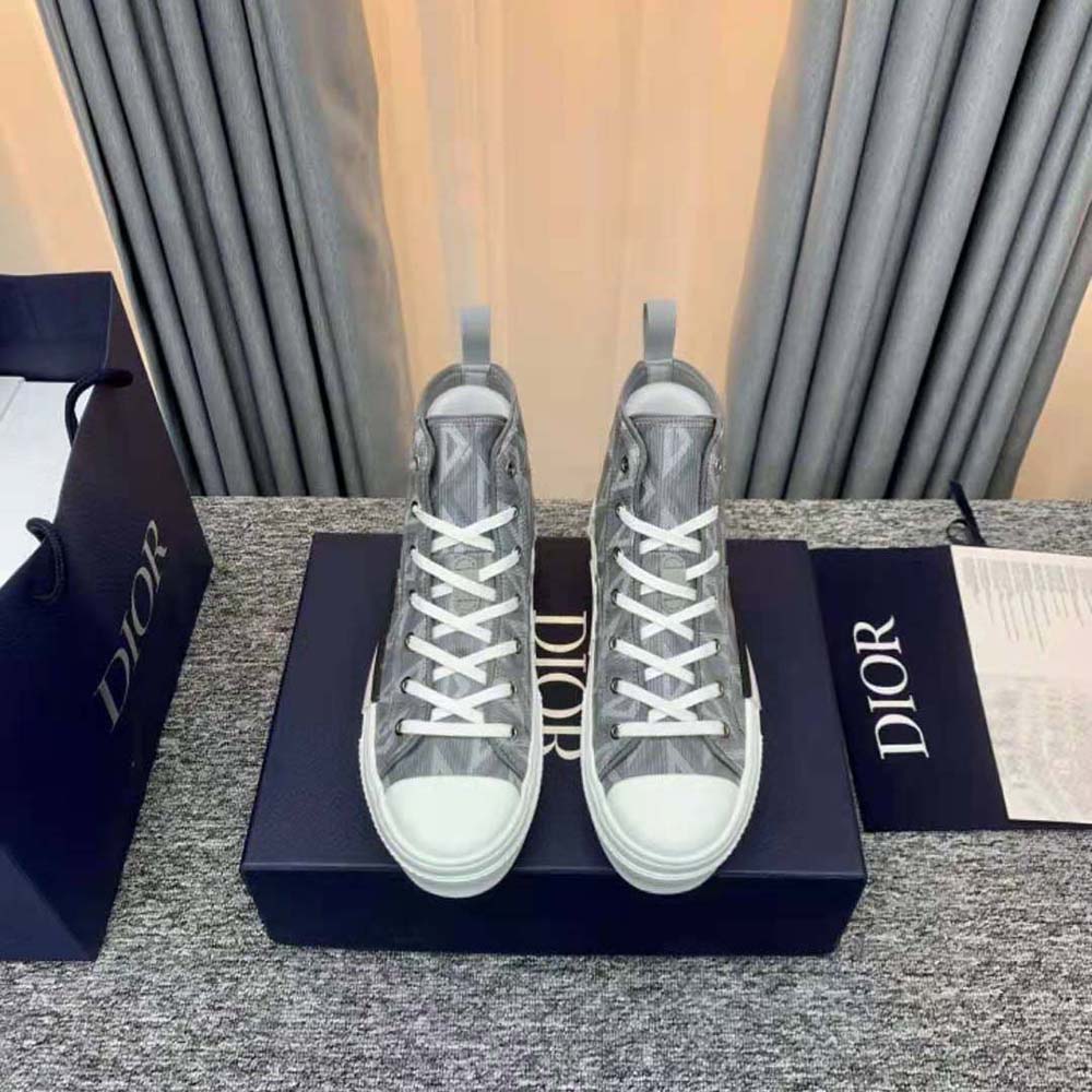 Close-up of diamond canvas and CD hardware detail on Dior sneaker