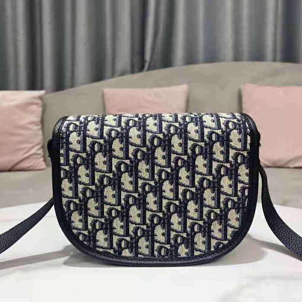 Side angle showing strap and silhouette of Dior Men Gallop Messenger Bag