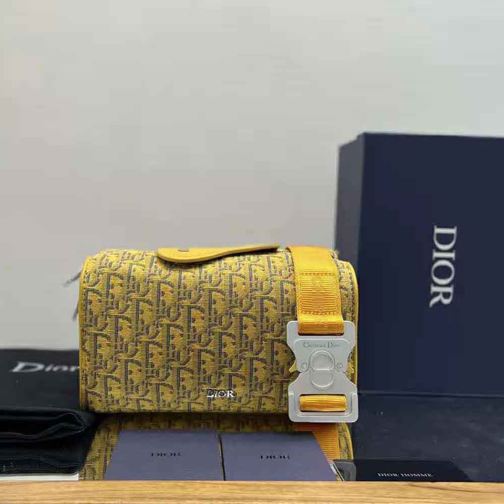 Close-up of gold-tone hardware on Dior Men Lingot 22 Bag