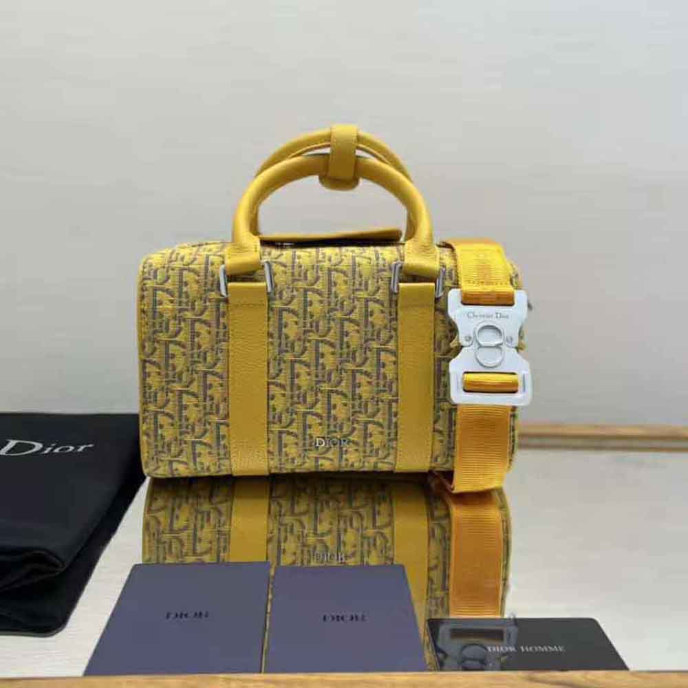 Close-up of gold-tone hardware detail on Dior Men Lingot 26 Bag