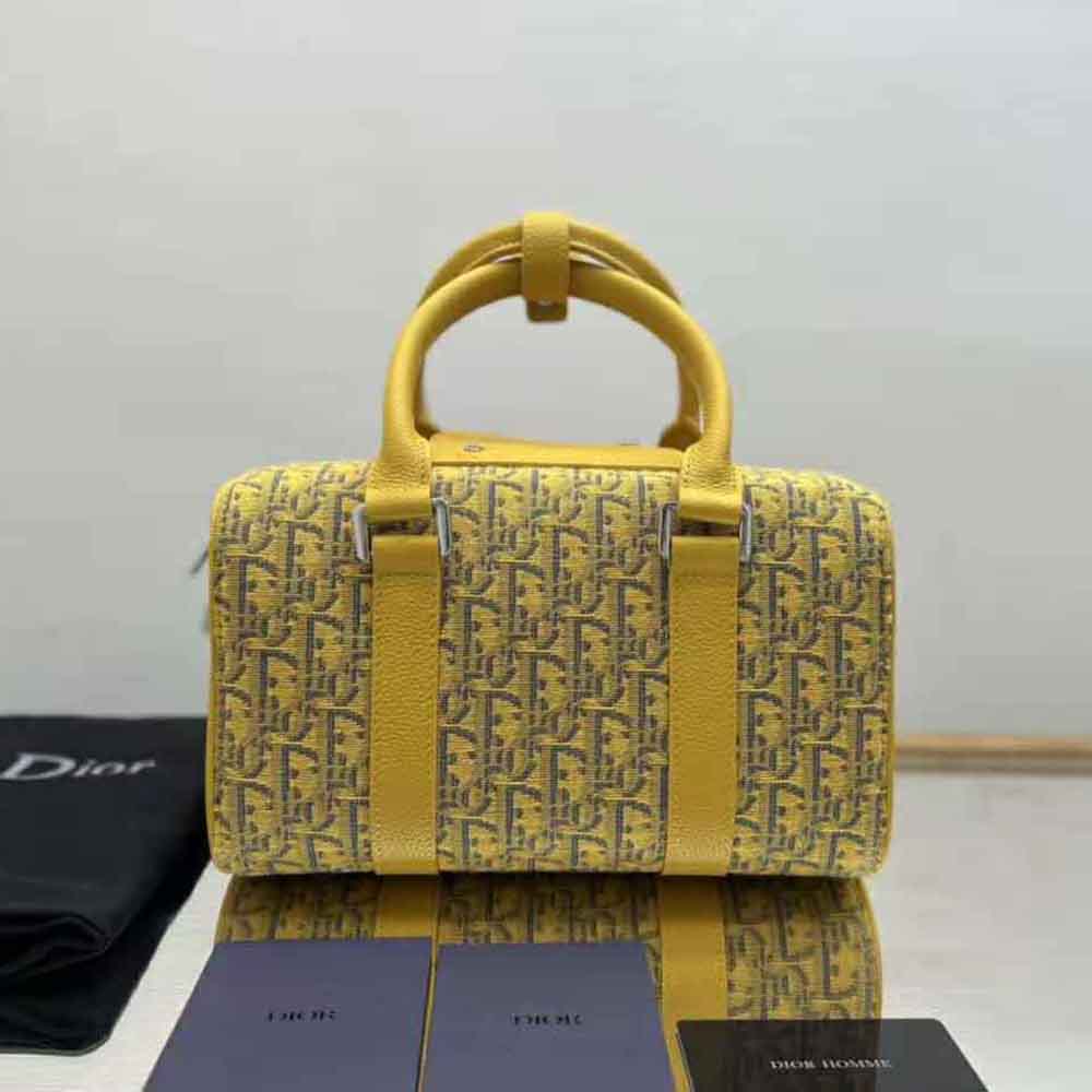 Side angle showcasing texture and silhouette of Dior Men Lingot 26 Bag
