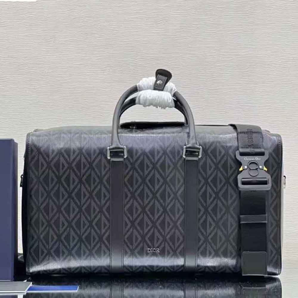Side profile showcasing shape of Dior Men Lingot 50 Duffle Bag