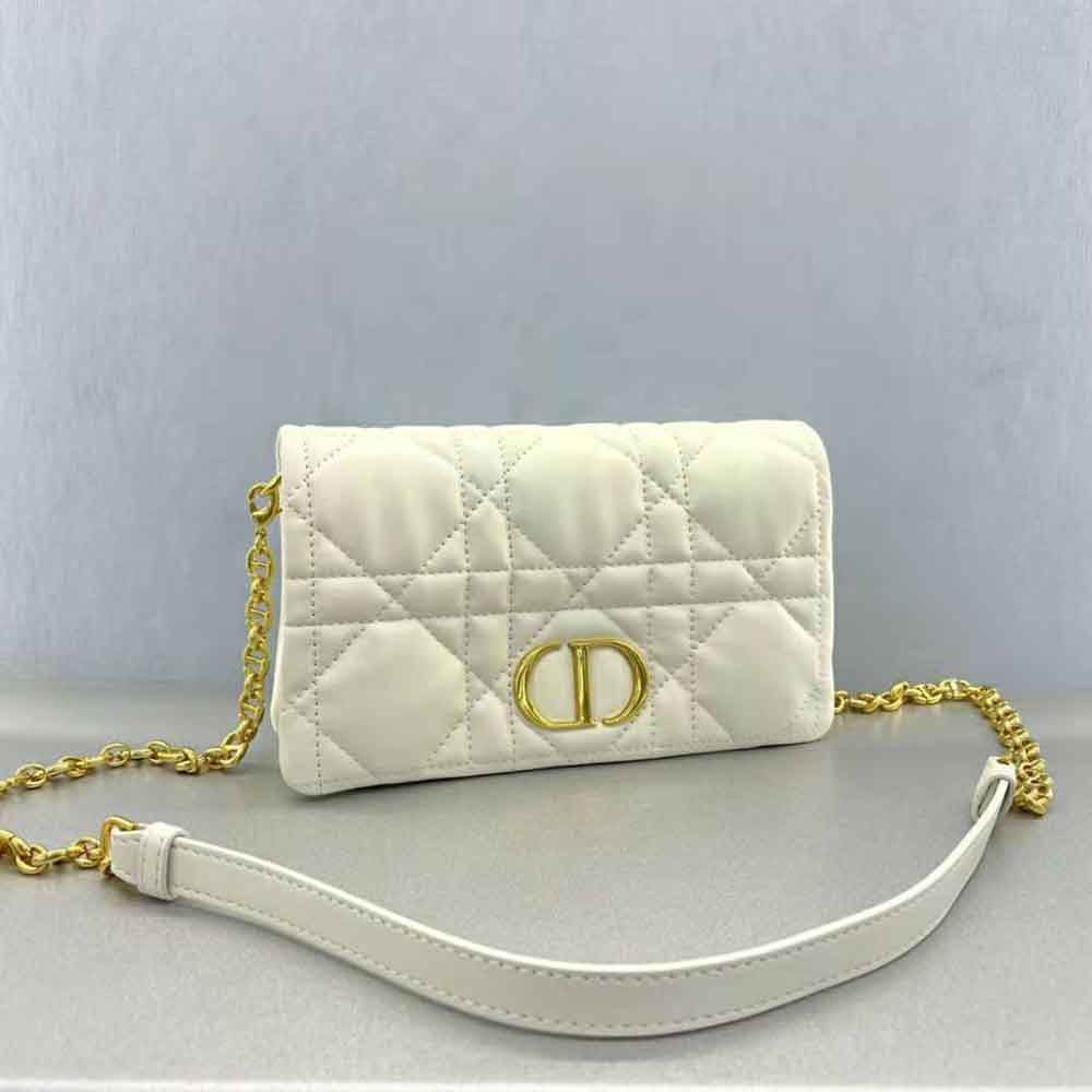 Side view showing compact silhouette of Dior Caro Macrocannage Pouch