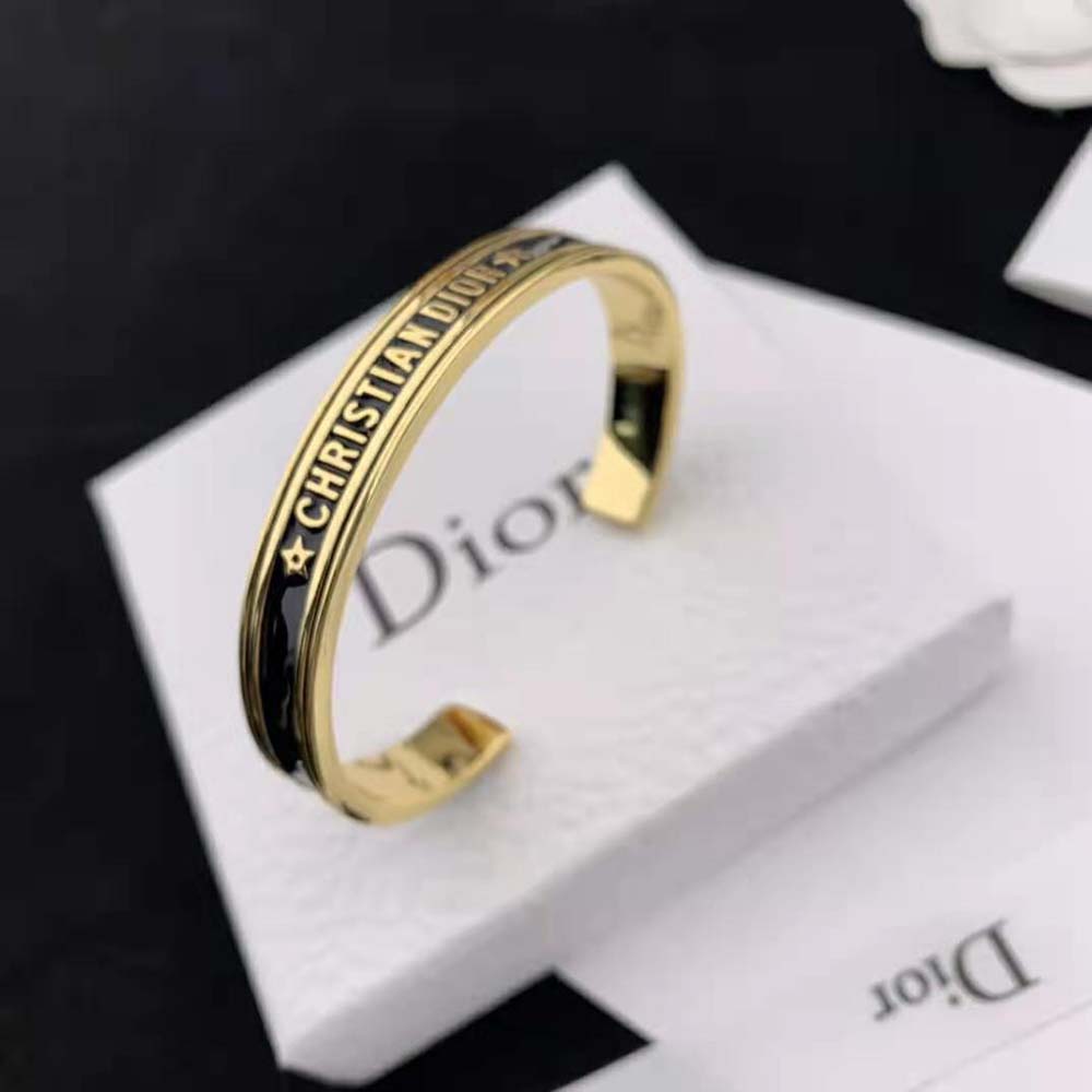 Side angle showing slim silhouette of Dior Women Code Bangle