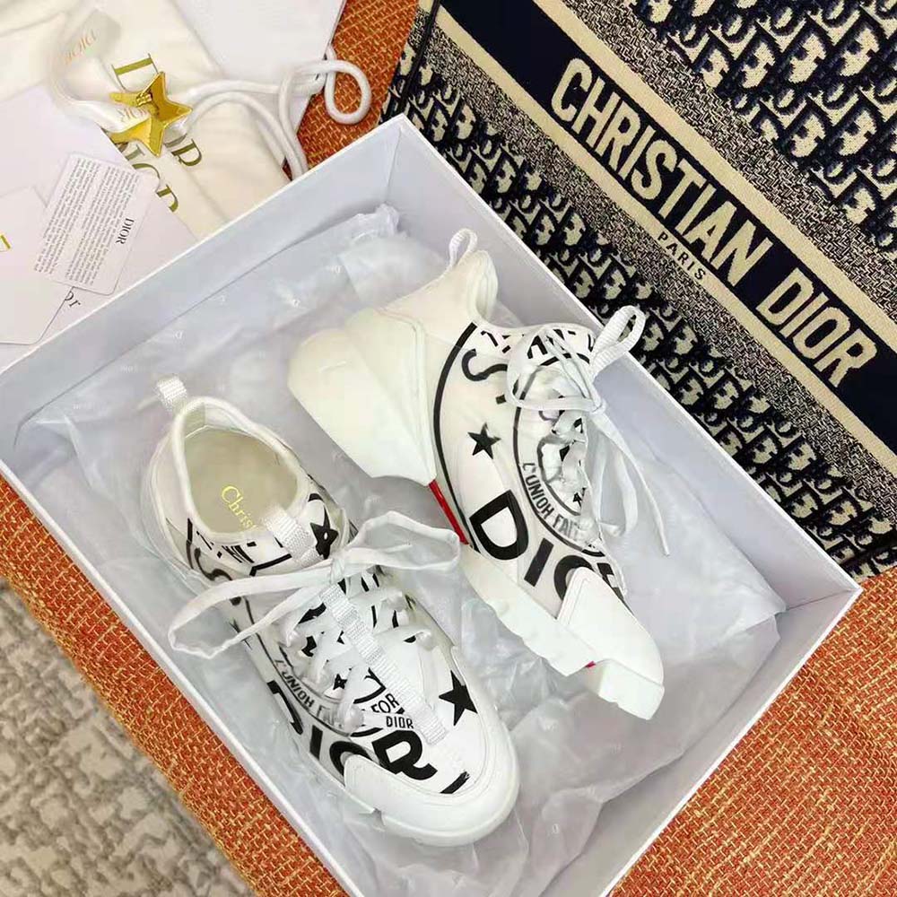 Side profile showing silhouette of Dior Women D-Connect Sneaker in white
